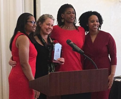 NHR accepts Delta Sigma Theta's Youth Development Community Award.