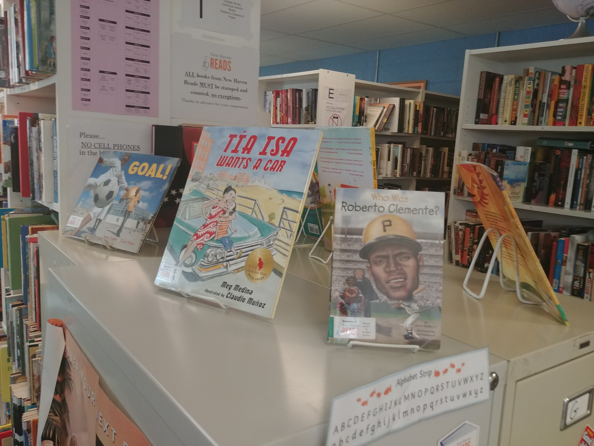 A display at the New Haven Reads Book Bank showcases books titles to celebrate Hispanic Heritage Month.